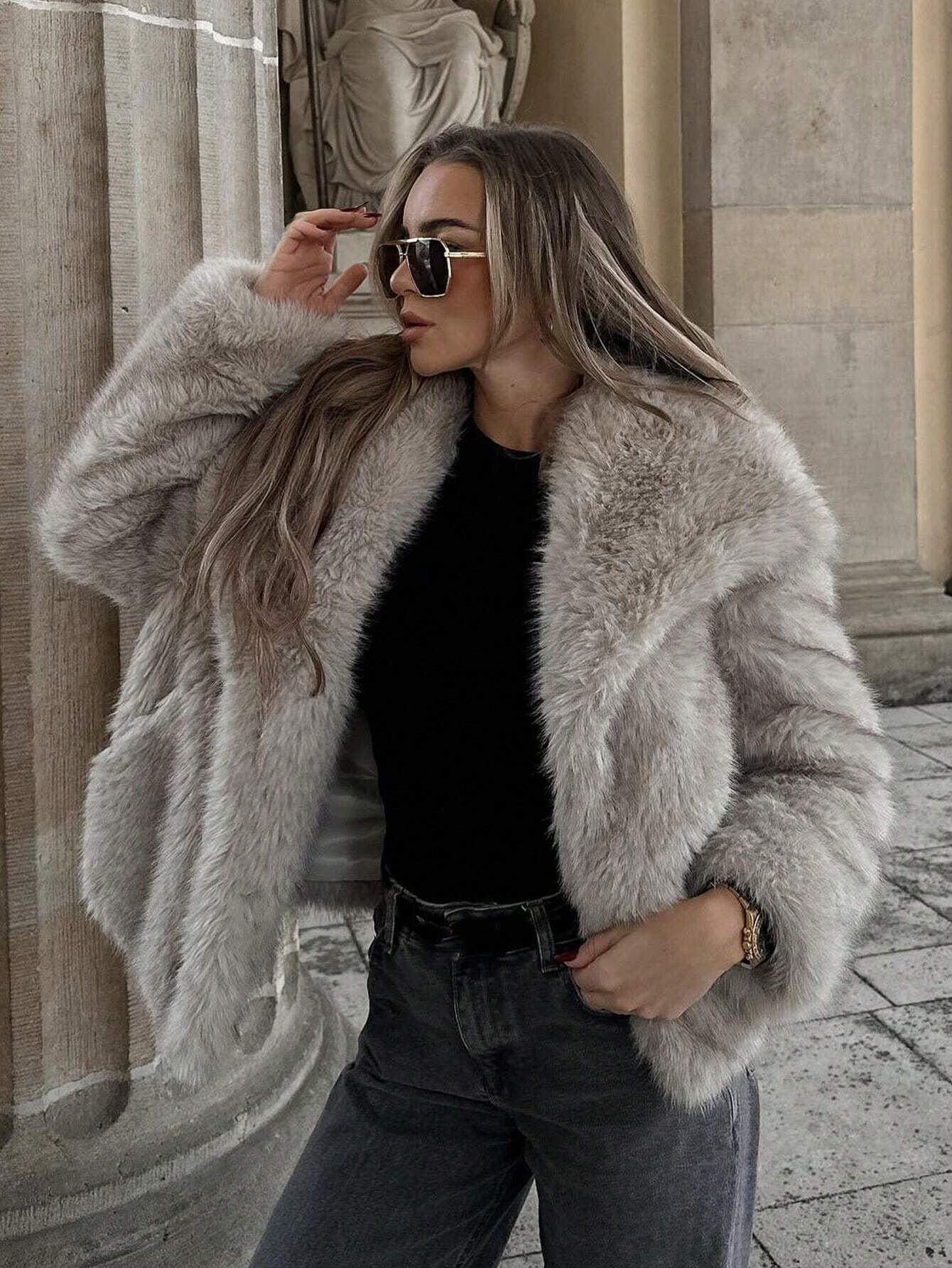 Cappotto in pelliccia sintetica a maniche lunghe