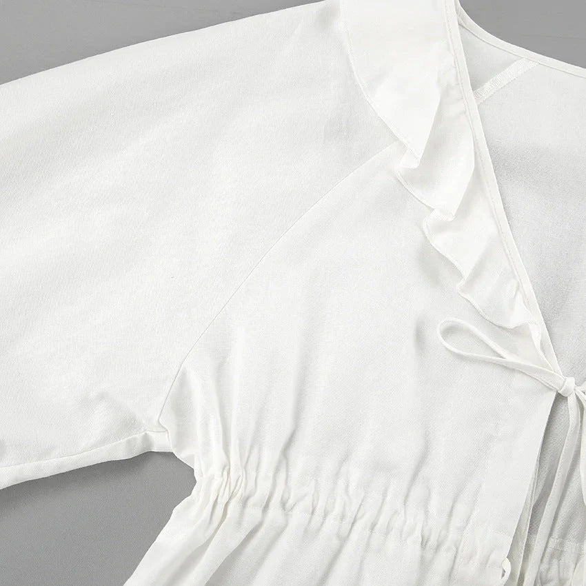 Alexandra - Top con volant e shorts con nodo frontale