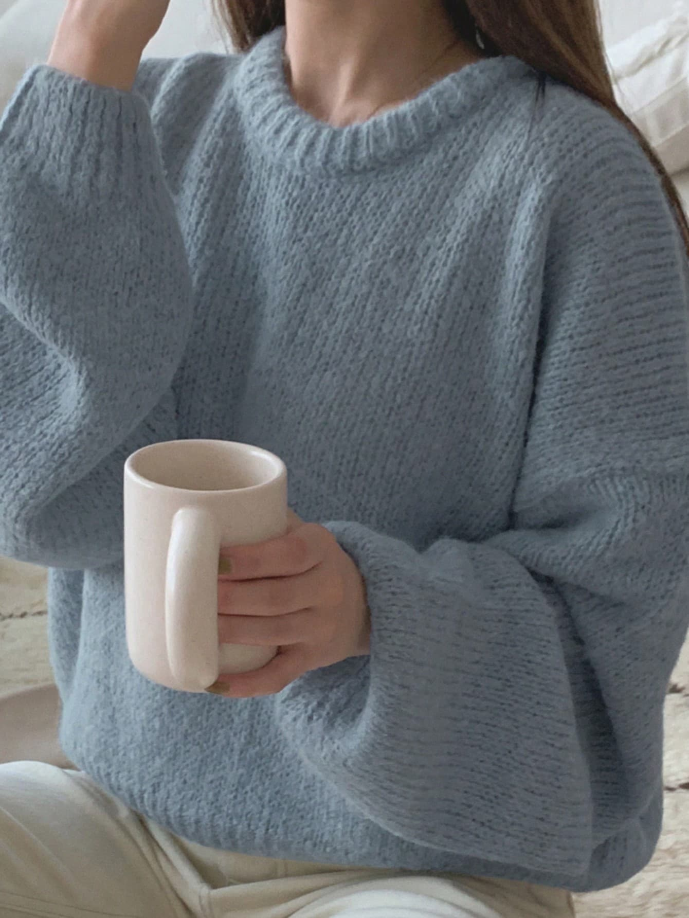 Maglione con spalle scese